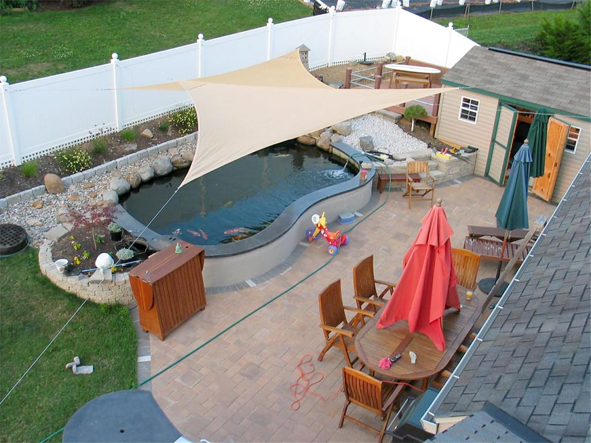 Galería Malla sombra velarias de 4 puntas